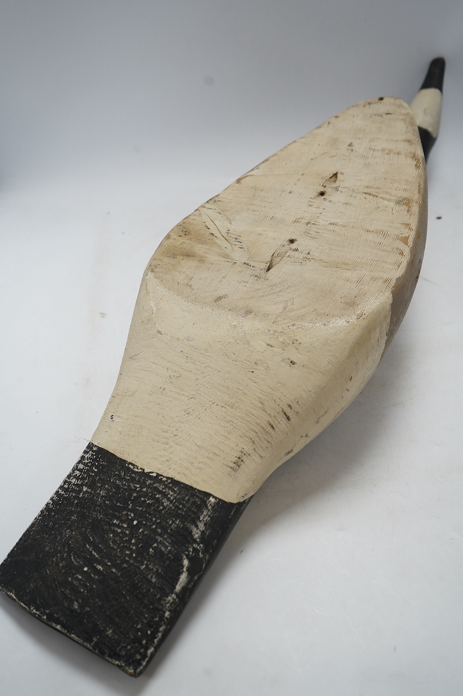 A vintage carved and painted wood decoy goose, 80cm in length. Condition - fair